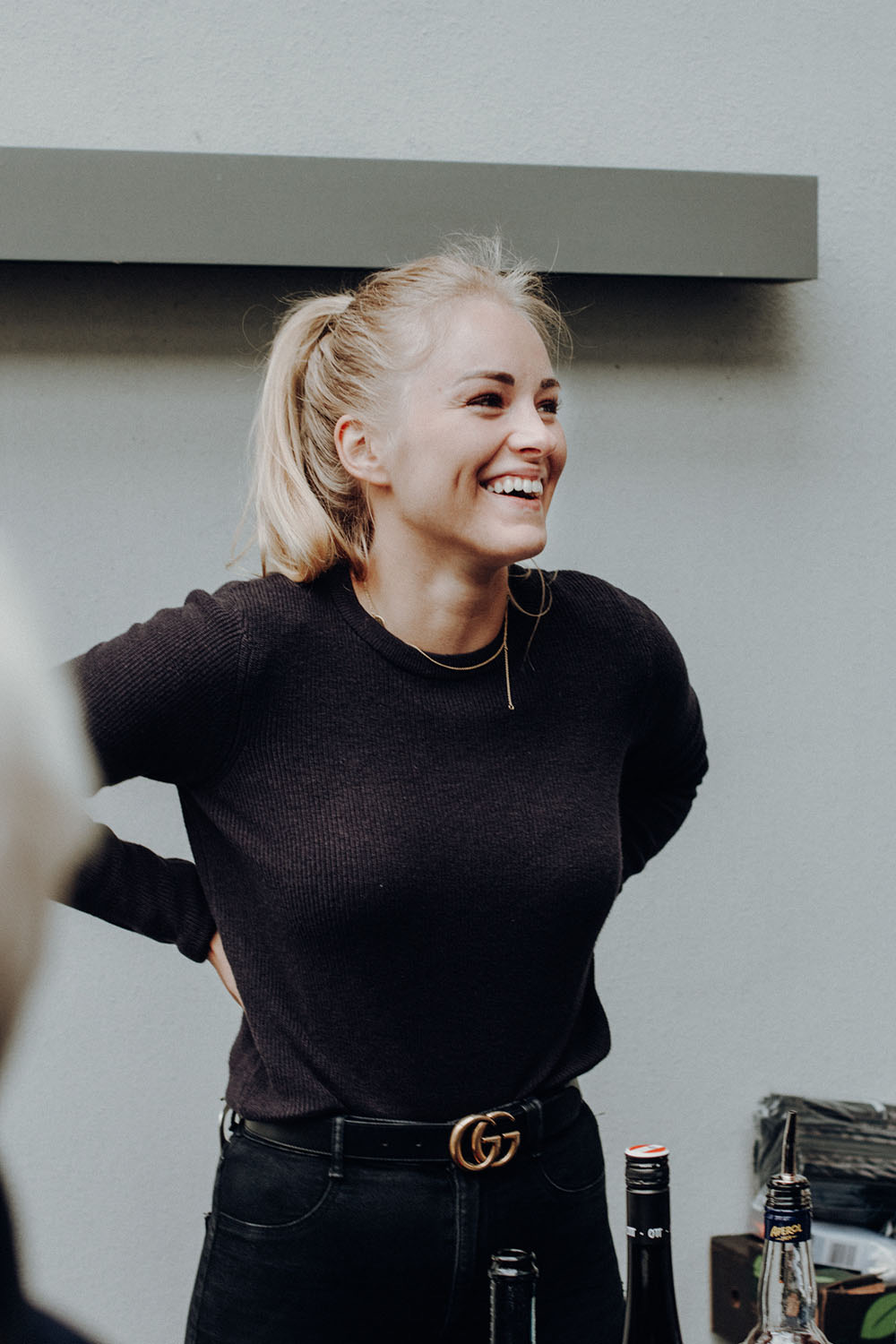 Laughing woman in a black top